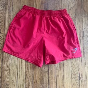 Red Gymshark exercise shorts